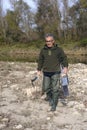 Gold researcher with his sluice in the French River Le Gardon