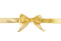 Gold ribbon with bow Royalty Free Stock Photo