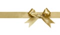 Gold ribbon with bow isolated Royalty Free Stock Photo