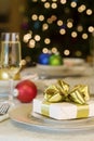 Gold ribbon gift on table Royalty Free Stock Photo