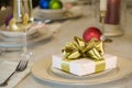 Gold ribbon gift on table Royalty Free Stock Photo