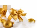 Gold ribbon gifts with christmas balls Royalty Free Stock Photo