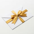 Gold ribbon on white envelope  on white background Royalty Free Stock Photo