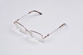 Gold-rimmed glasses Royalty Free Stock Photo