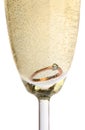 Gold ring in champagne Royalty Free Stock Photo