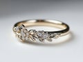 A gold ring with a cluster of diamonds on it Royalty Free Stock Photo