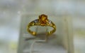 NGold ring decorated withnYellow gem Beautiful and expensivenElegant and rare Royalty Free Stock Photo