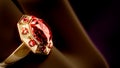 gold ring on finger with red ruby gem stone, not real design - object 3D illustration Royalty Free Stock Photo