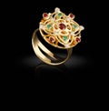 Gold ring with gems on black Royalty Free Stock Photo