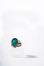 Gold ring with a large green emerald. Jewelry. Royalty Free Stock Photo