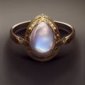 Gold Ring With Pear Cut Rainbow Moonstone Royalty Free Stock Photo