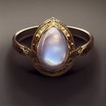 Gold Ring With Pear Cut Rainbow Moonstone