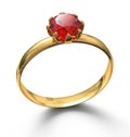 Gold ring with ruby gemstone on white Royalty Free Stock Photo