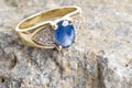 Gold Ring with Sapphire and Diamonds Royalty Free Stock Photo