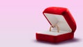 Gold ring, wedding ring in red box. The moment of a wedding, anniversary, engagement, or Valentine's Day. Happy day. Royalty Free Stock Photo