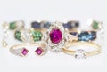 Gold rings with rubies, emeralds, sapphires