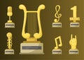 Gold rock star trophy music notes best entertainment win achievement clef and sound shiny golden melody success prize Royalty Free Stock Photo