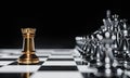 Gold rook facing the opponent on silver side chess pieces for competition game and tournament match on a chessboard background. Royalty Free Stock Photo