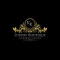 Gold Royal Luxury Boutique KK Letter Logo. Royalty Free Stock Photo