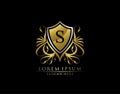 Gold Royal Shield S Letter Logo. Graceful Elegant gold shield icon design