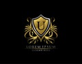 Gold Royal Shield U Letter Logo. Graceful Elegant gold shield icon design