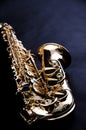 Gold Saxophone Isolated on Black Bk