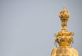 a sculture on the temple rooftop