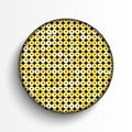 Gold sequin circle button on white background.