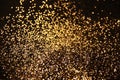 Gold sequins. Christmas, holiday background. Sparkles of golden plate texture background. Royalty Free Stock Photo