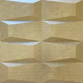 Gold shimmering 3D wall panel texture with wavy shape