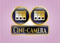 Gold shiny emblem with three folders icon and Cine-camera text inside EPS10 Royalty Free Stock Photo