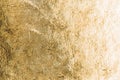 Gold shiny foil background, yellow gloss metallic texture