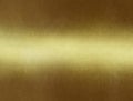 Gold shiny foil background, yellow gloss metallic texture. Royalty Free Stock Photo