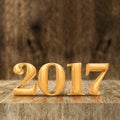 Gold shiny 2017 new year 3d rendering at wooden block table an