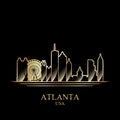 Gold silhouette of Atlanta on black background