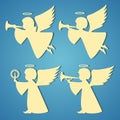 Gold silhouettes of angels on blue background Royalty Free Stock Photo