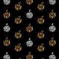 Gold and silver abstract apples on a black background. Vector