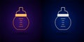 Gold and silver Baby milk in a bottle icon isolated on black background. Feeding bottle icon. Vector Royalty Free Stock Photo