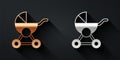 Gold and silver Baby stroller icon isolated on black background. Baby carriage, buggy, pram, stroller, wheel. Long Royalty Free Stock Photo