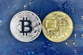 Gold and Silver bitcoin and motherboard Royalty Free Stock Photo