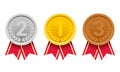 Gold, silver and bronze medals with red ribbon. Awards for winners and champions Royalty Free Stock Photo