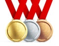 Gold, silver and bronze medals with red ribbons on white background Royalty Free Stock Photo