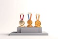 Gold, silver and bronze Olympic medals on ribbon for awarding