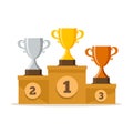 Gold, Silver and Bronze trophy cup on prize podium. Royalty Free Stock Photo