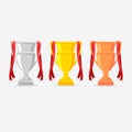 Gold, Silver and Bronze Trophy Cup with red ribbon. Cups for winners. Royalty Free Stock Photo