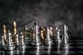 Gold and Silver Chess on chess board game for business metaphor leadership concept Royalty Free Stock Photo