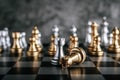 A gold and Silver Chess on chess board game for business metaphor leadership concept Royalty Free Stock Photo