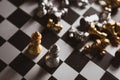 Gold and Silver Chess game king staying on chessboard