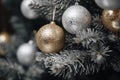 gold and silver christmas ornaments on a fir tree Royalty Free Stock Photo