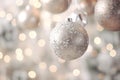 gold and silver christmas ornaments hanging from a string Royalty Free Stock Photo